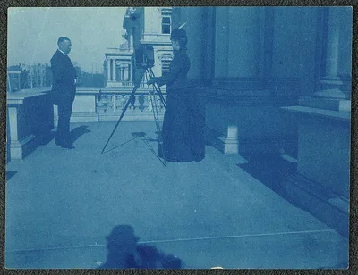 [Frances Benjamin Johnston on a balcony of the State, War and Navy…, Washington D.C., 1888