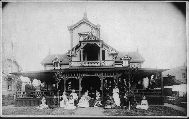 [27 men and women (Johnston family) in front of beach house…, 1880