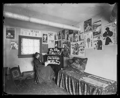 Photograph from 1895: [Frances Benjamin Johnston seated at a desk in…
