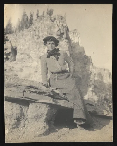 [Frances Benjamin Johnston, full-length portrait, sitting on ledge…, 1888