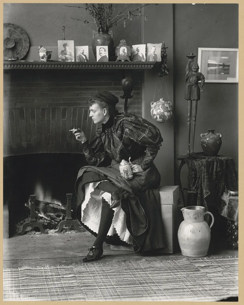 [Frances Benjamin Johnston, full-length portrait, seated in front of…, Washington D.C., 1896